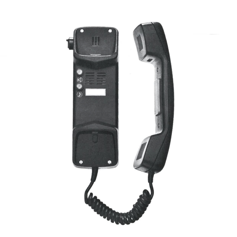 Halterung liegt neben Handapparat, dieser liegt auf der Seite, beides ist mit einem Kabel verbunden