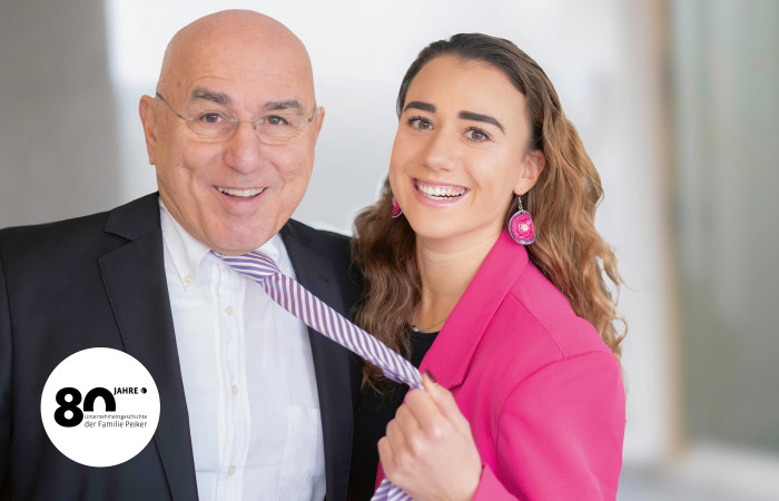 Andreas und Carina Peiker mit 80 Jahre Patch